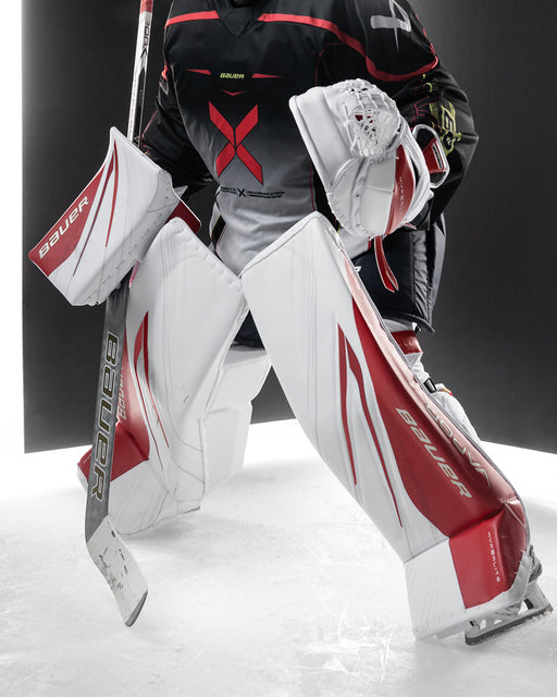 Goalie dressed in all bauer hyperlite 2 goalie equipment in a photoshoot